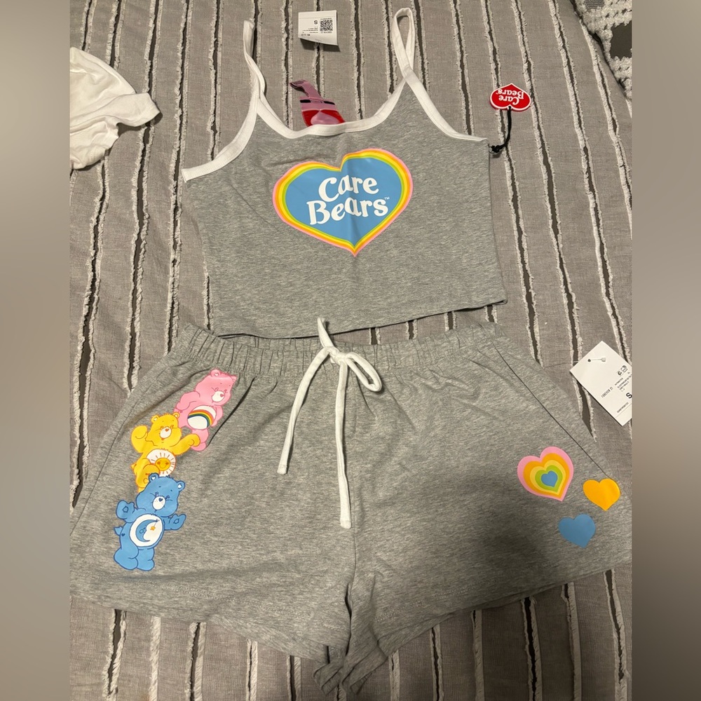 Women’s size Small 2 piece pajama set. Care Bears design.
